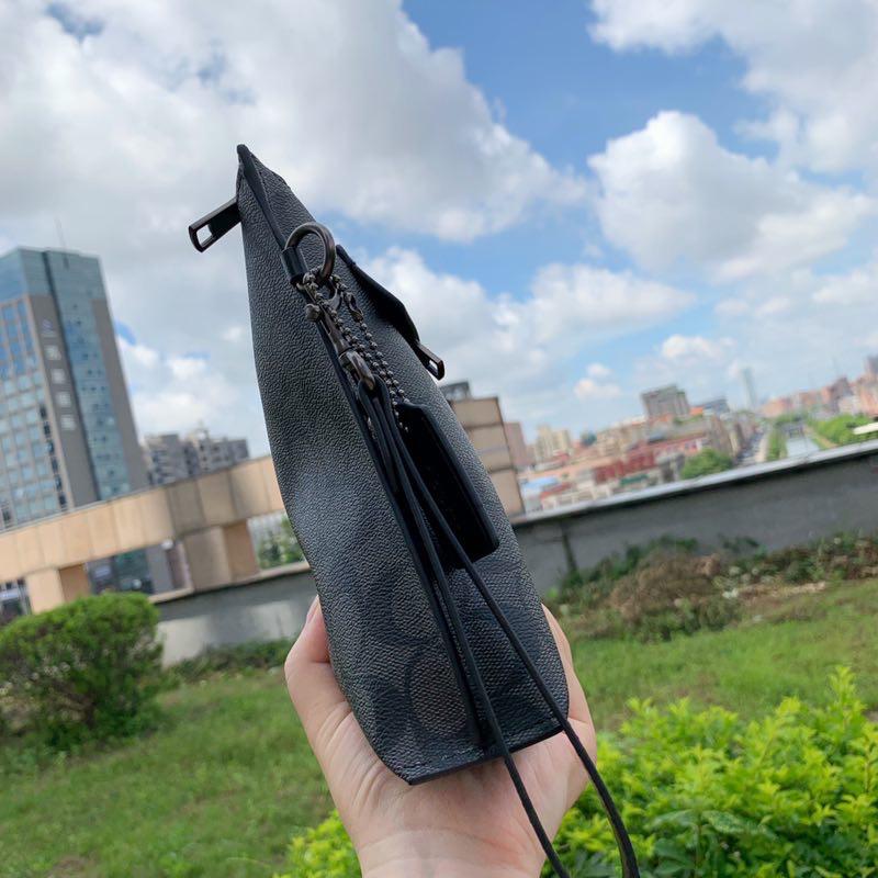 Coach Carryall Pouch In Signature Canvas (Black)