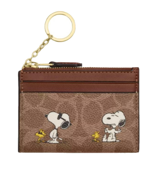 Coach X Peanuts Mini Skinny Id Case In Signature Canvas Snoopy